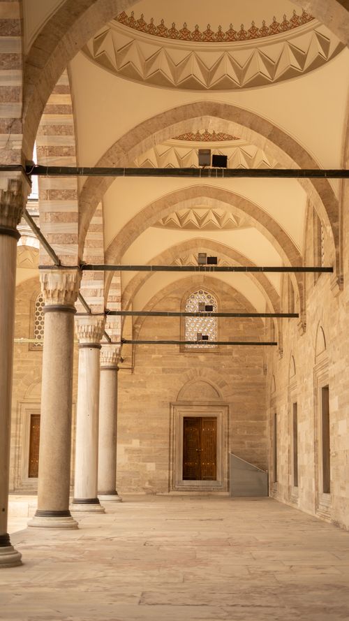 Free Beautiful colonnades in a historic Istanbul mosque showcasing Islamic architecture. Stock Photo