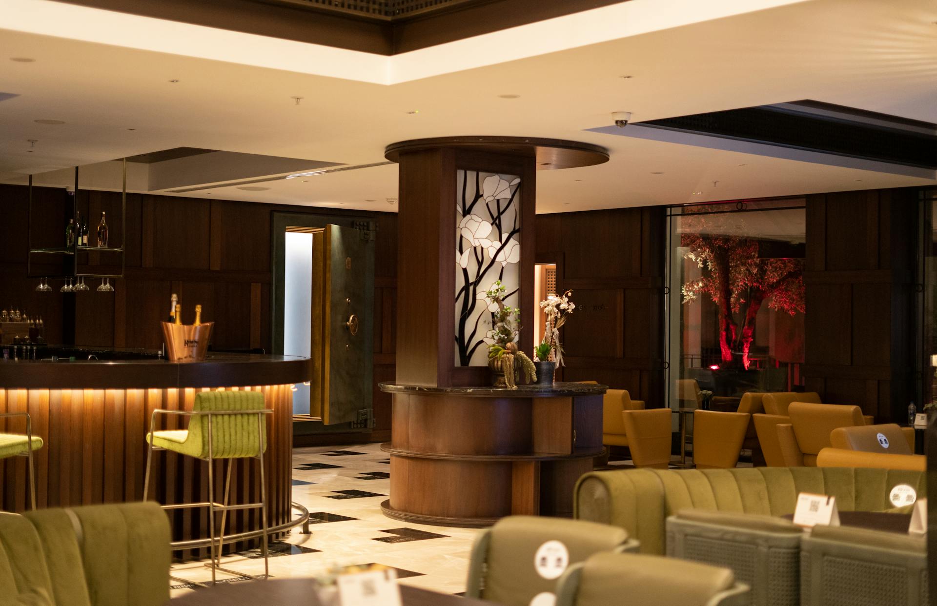 Luxurious hotel lobby in Istanbul with modern furnishings and warm lighting.