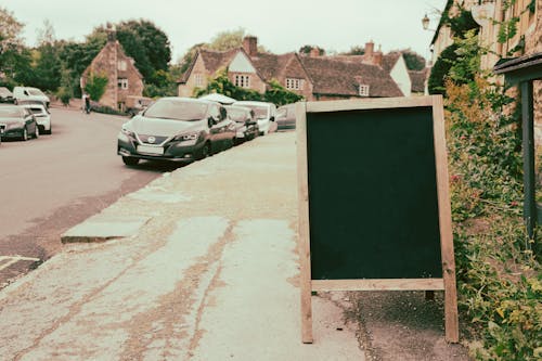 Blackboard with Wooden Stand on the Street