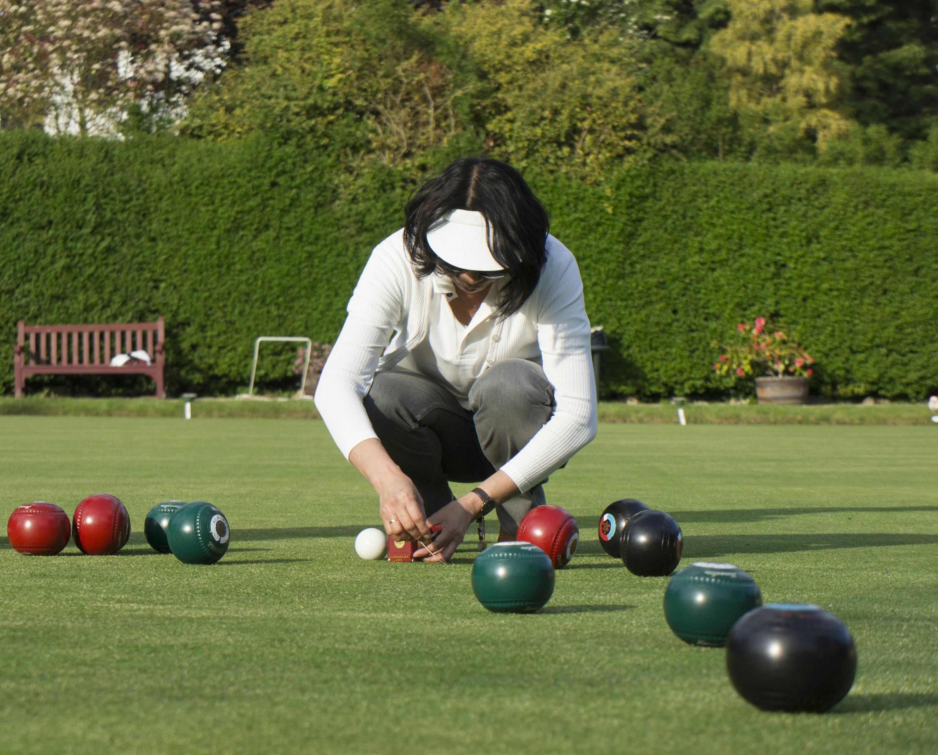 Free stock photo of lawn bowling, measuring bowls