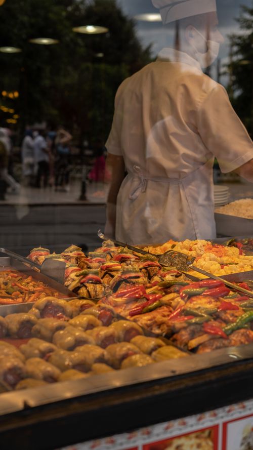 Free Tempting array of street food served by a chef in Istanbul, offering a taste of Turkish culinary flavors. Stock Photo