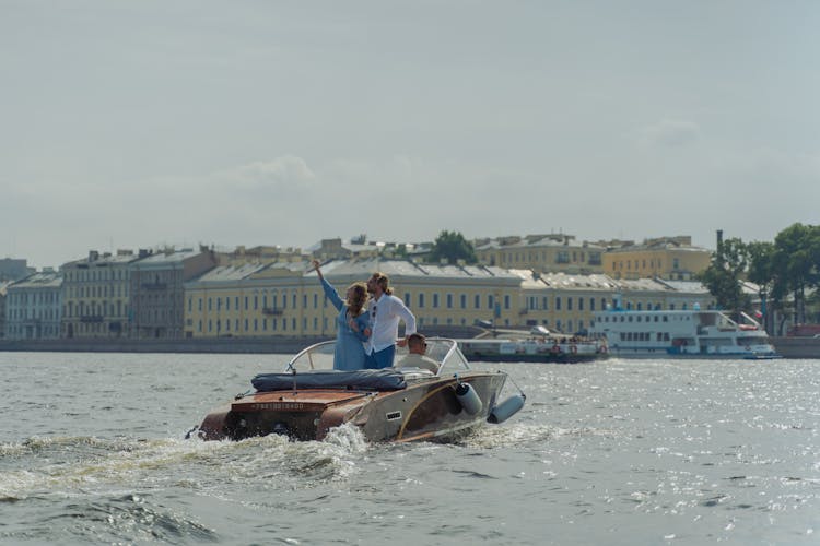 A Couple Sightseeing While On A Boat 