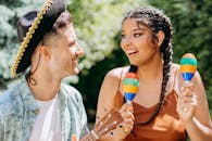 A Couple Playing Musical Instruments