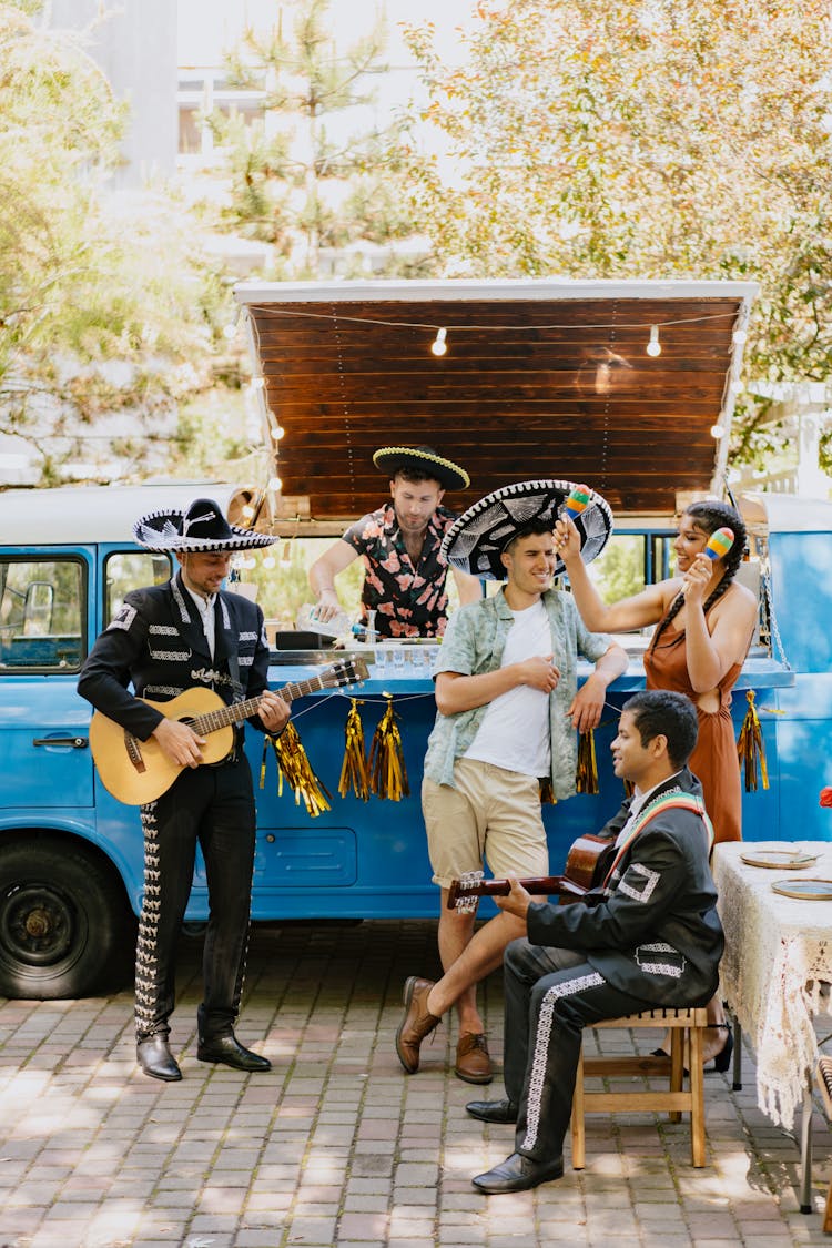 A Mariachi Band Playing At A Bar