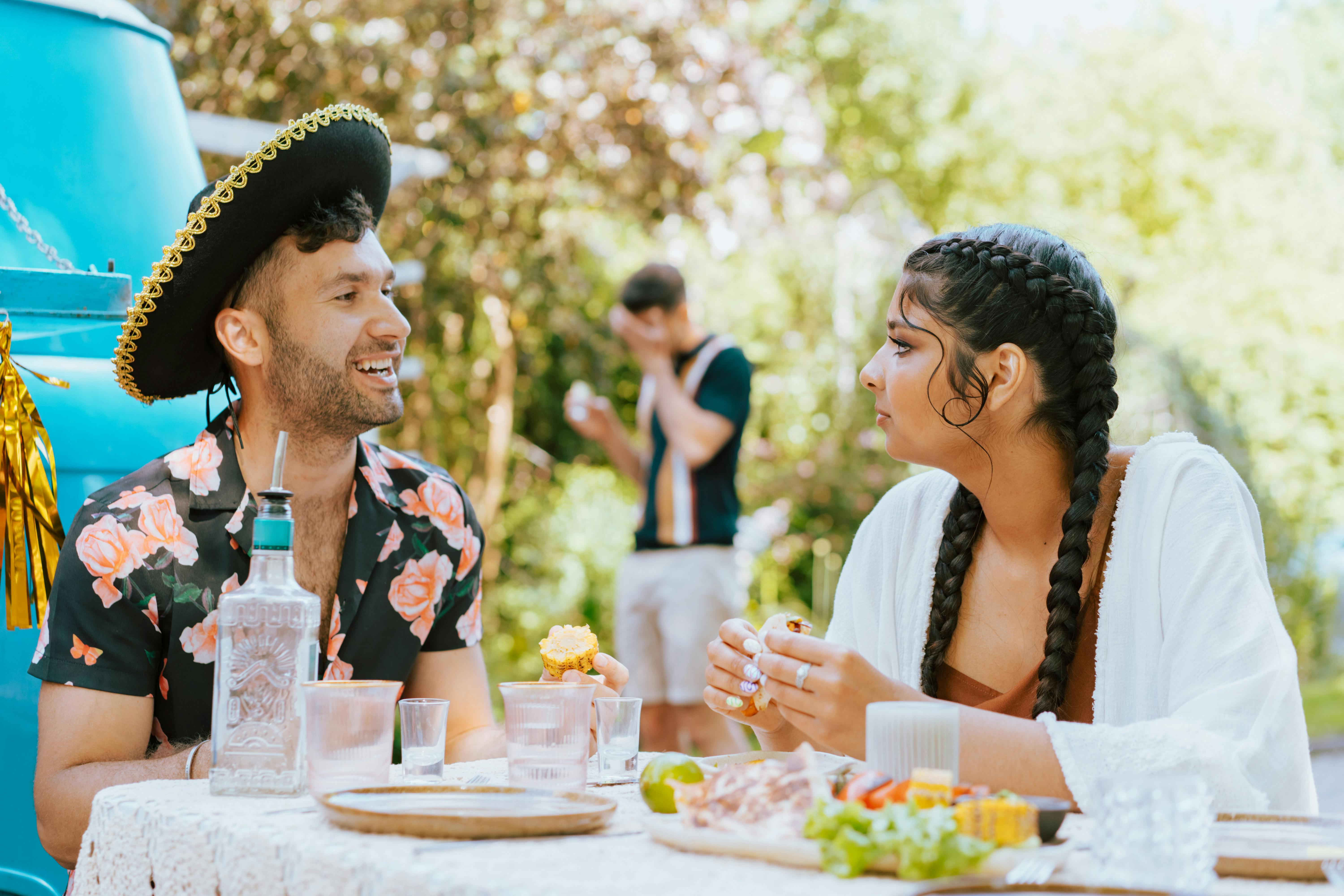 a couple eating and drinking together