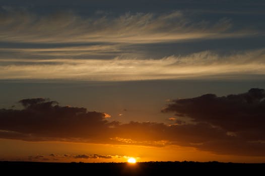 Stunning sunset with golden hues over Wales, United Kingdom.