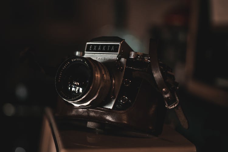 An Exakta  Varex Iib Camera With A Brown Leather Case