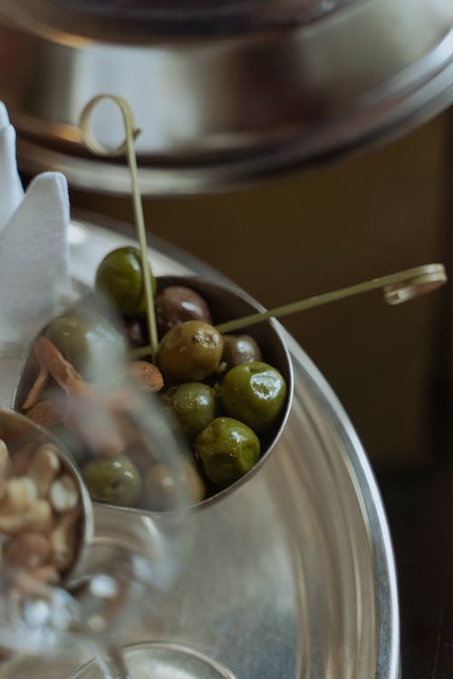 Free Green Olives in the Silver Bowl Stock Photo