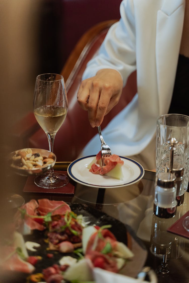 Fine Dining With Food Platter And White Wine