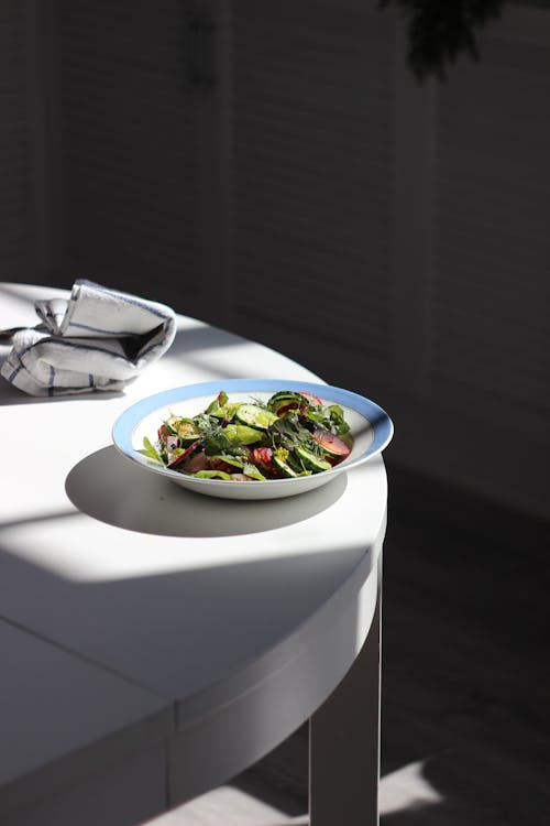 Free 
A Plate of Vegetable Salad on a Table Stock Photo