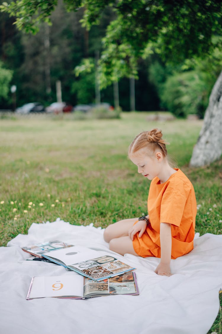 A Girl Reading A Book