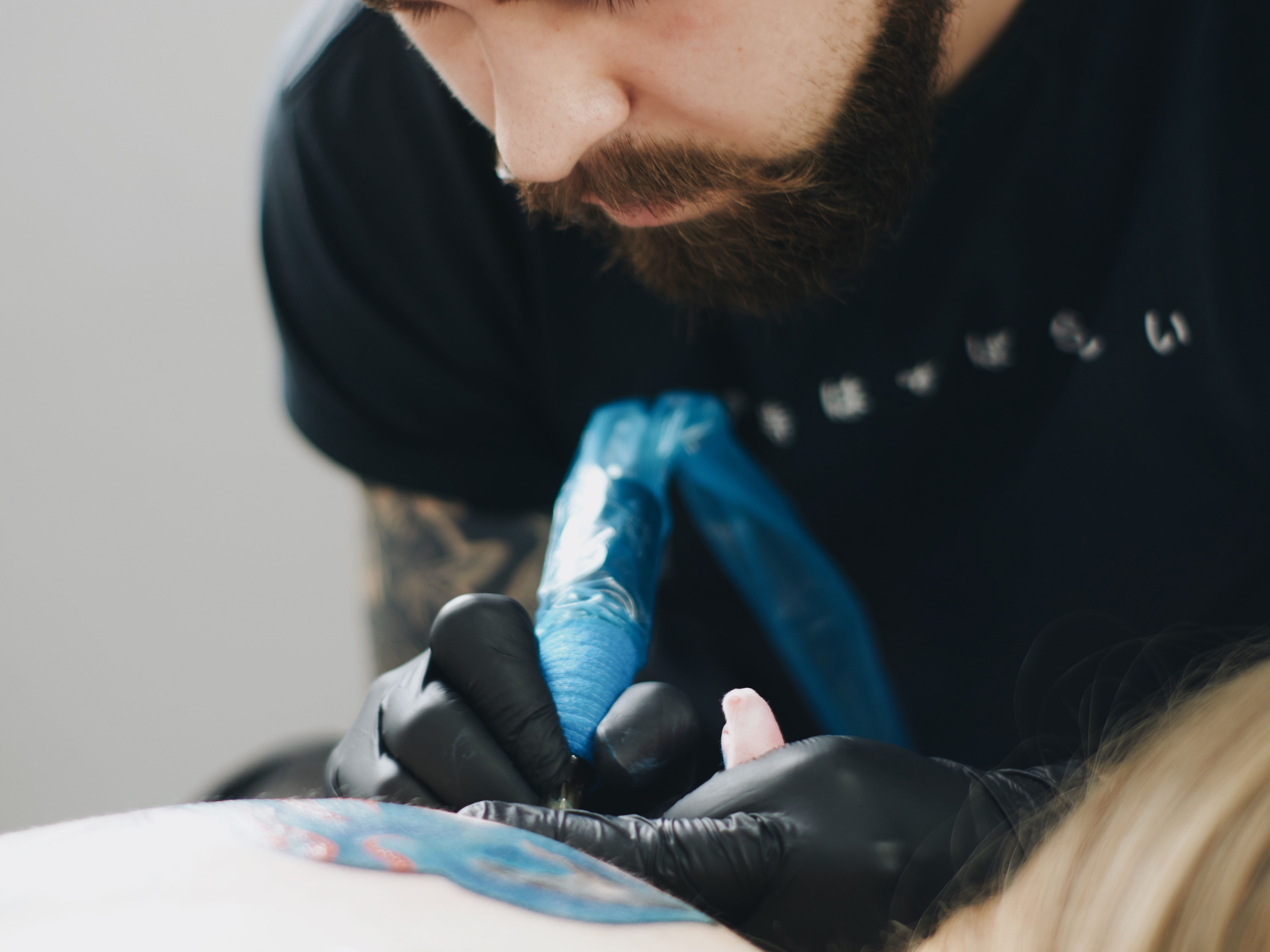 Aspiring tattoo artist practicing drawing fundamentals before picking up a tattoo machine