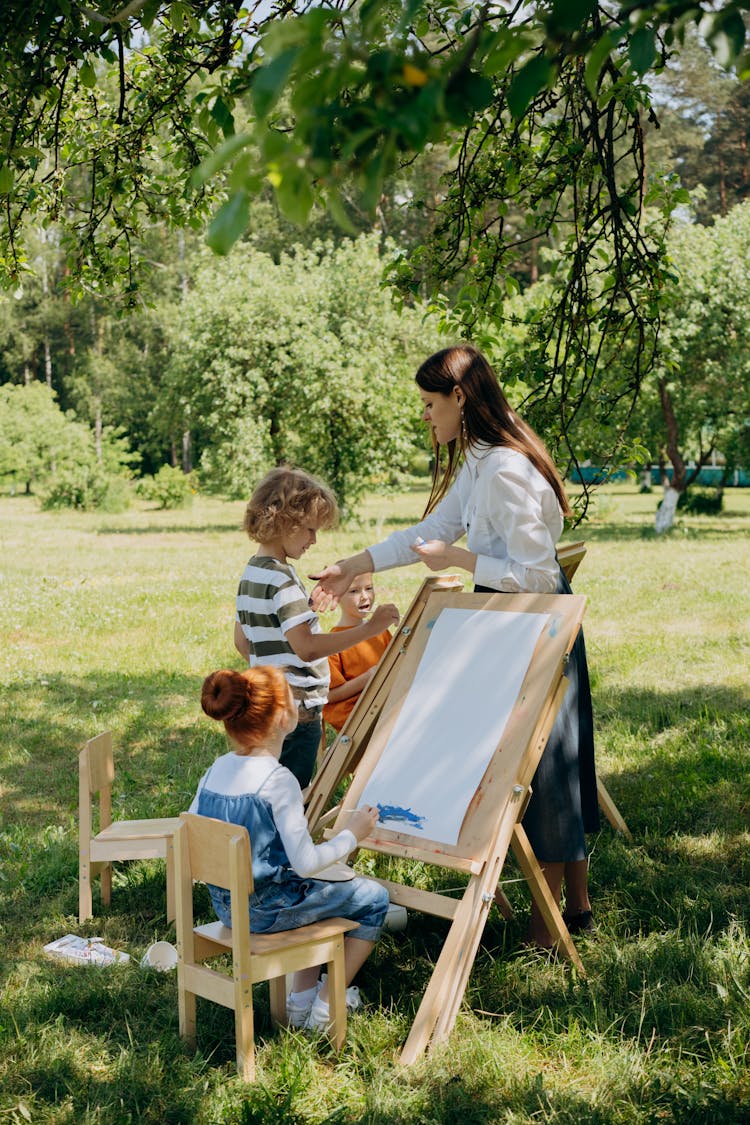 Kids Doing Painting Activity Outside 