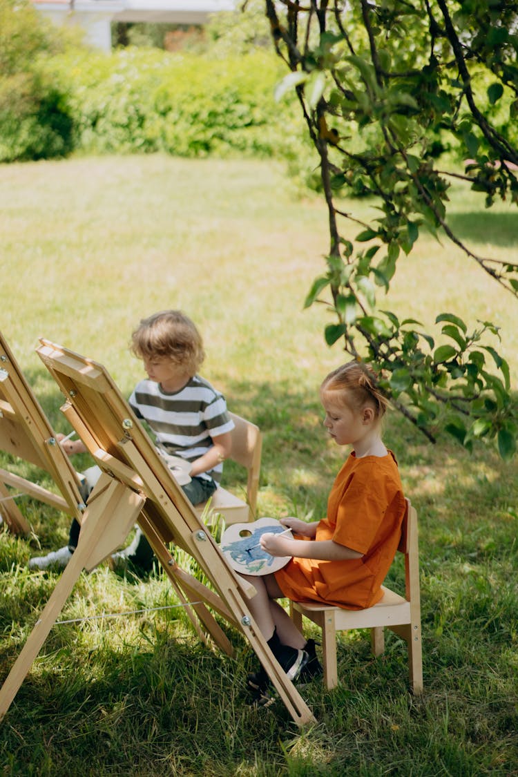 Kids Painting In The Garden