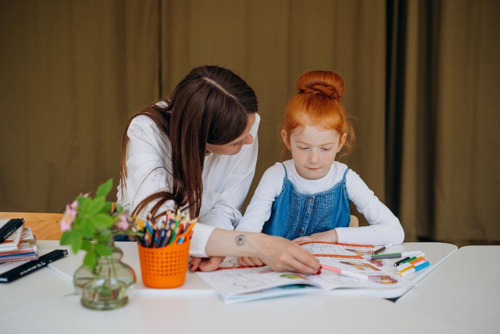 A learning specialist working one-on-one with a student