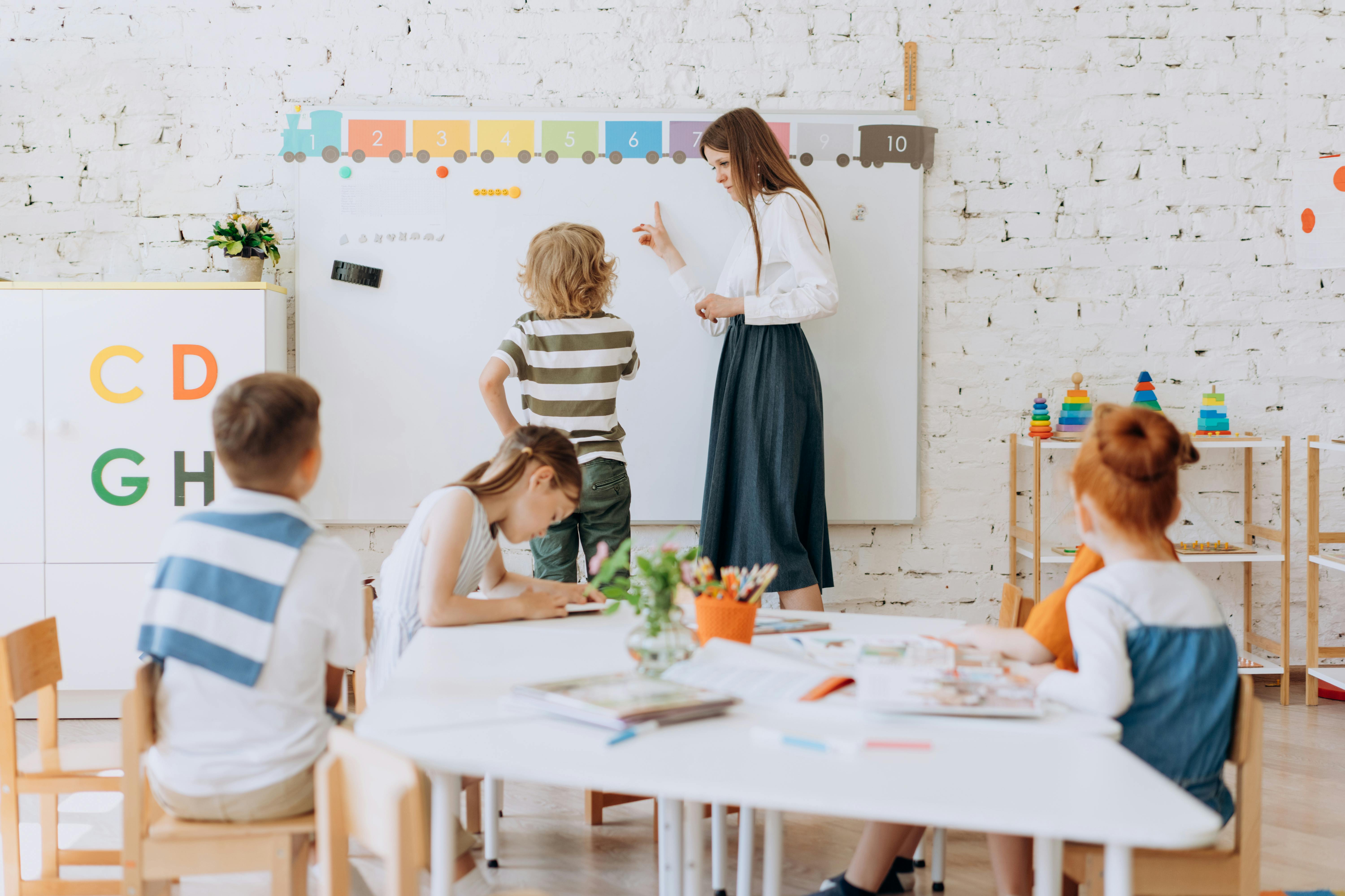 Free A Teacher Teaching in the Classroom Stock Photo