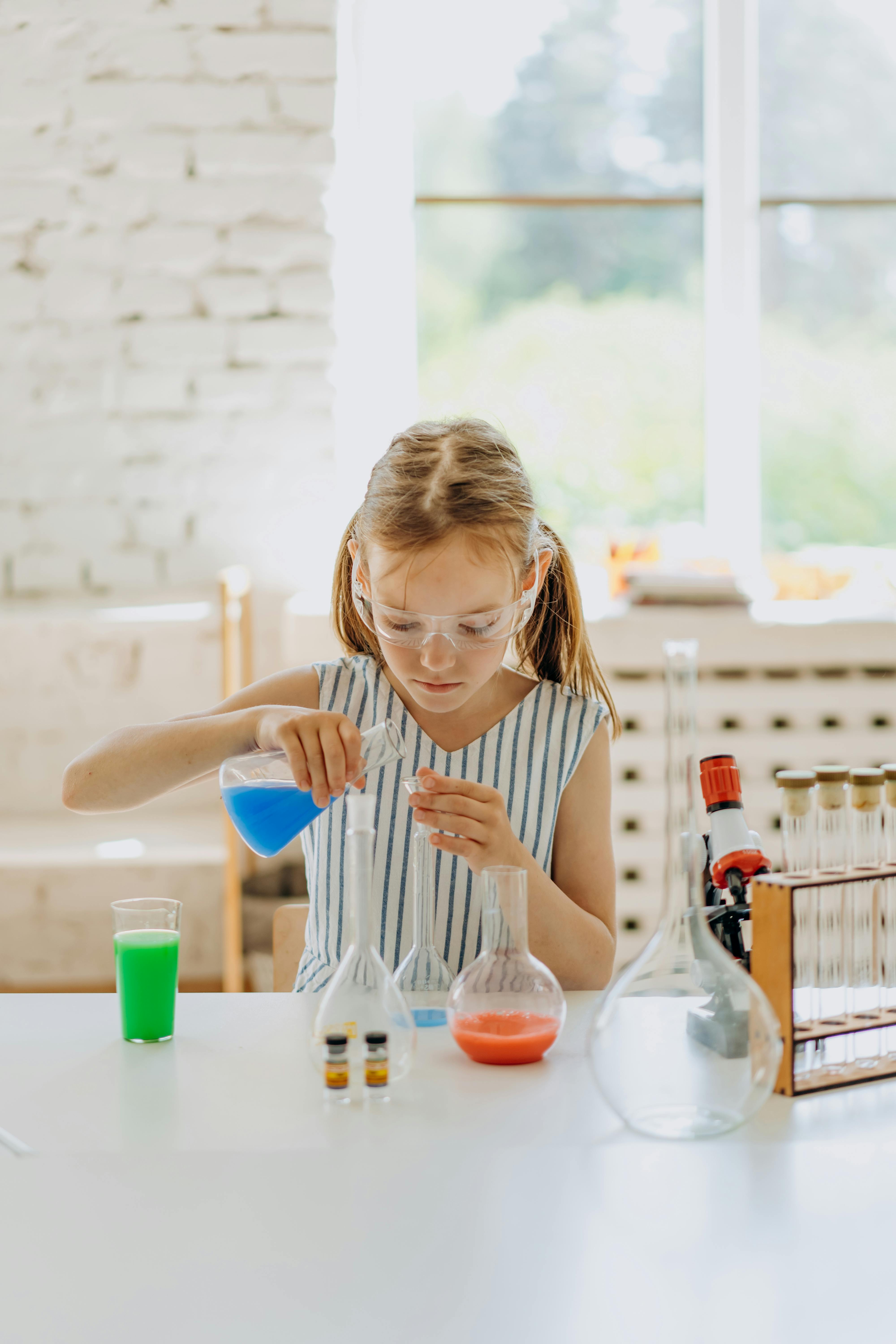 a girl doing a science experiment