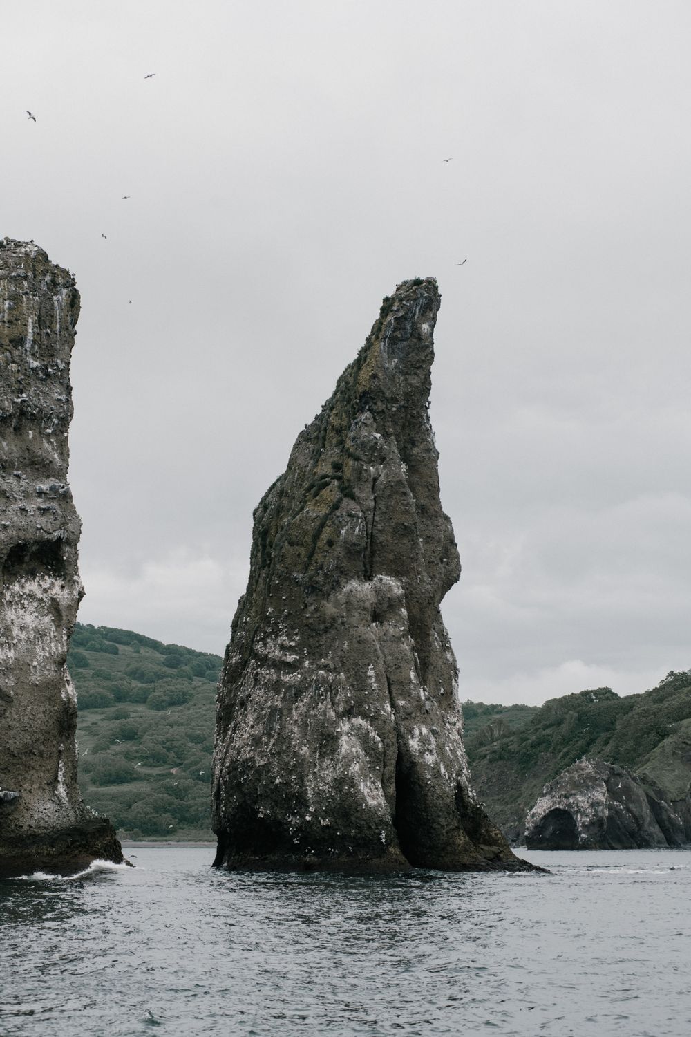 A Big Rock Formation in the Sea · Free Stock Photo