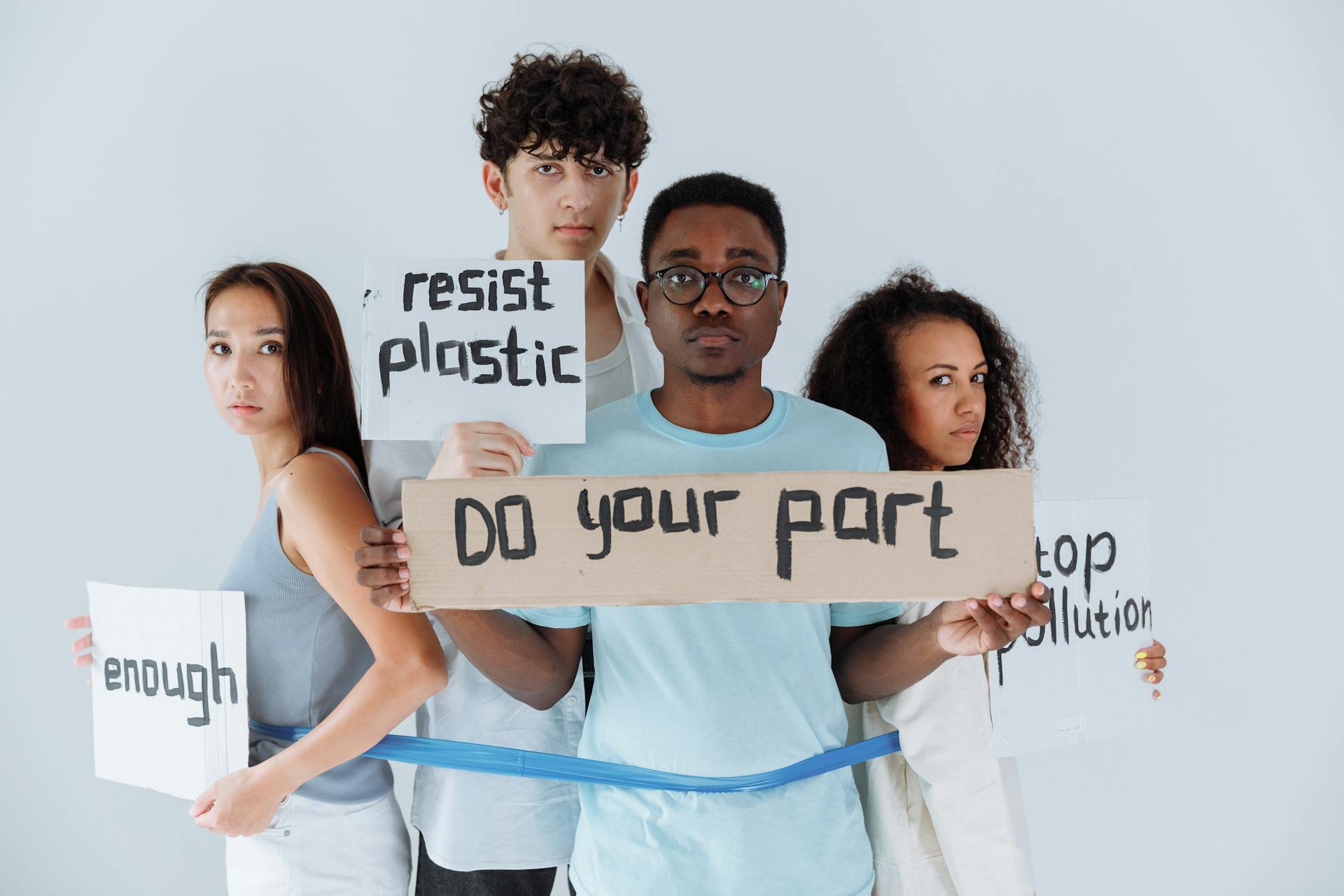 Group of People Holding Protest Signs