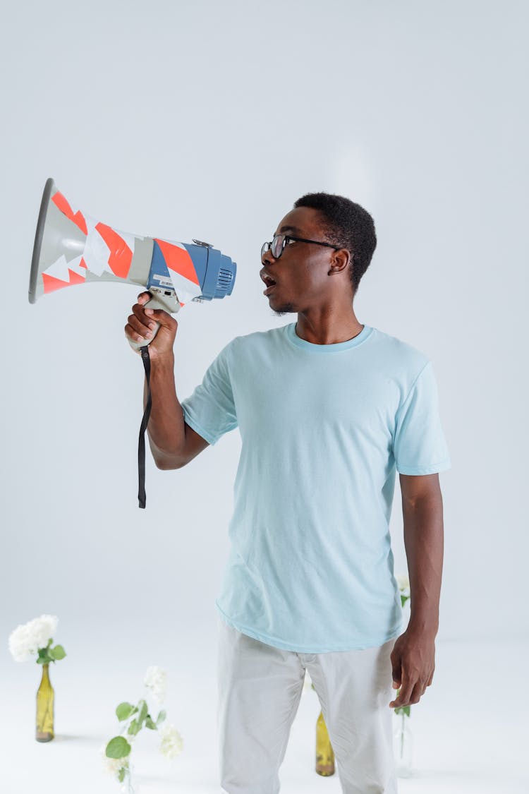 A Man Using A Megaphone