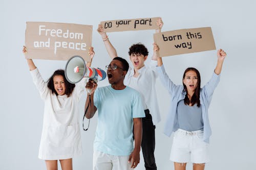 Group of People Holding Protest Signs