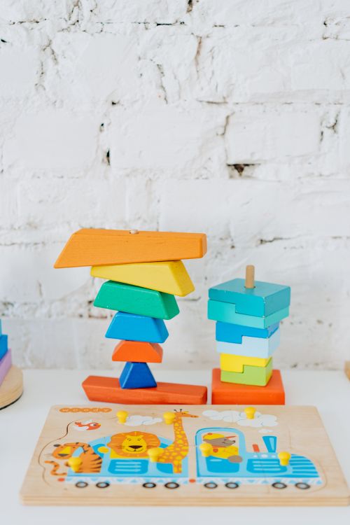 Vibrant wooden shapes and puzzle pieces