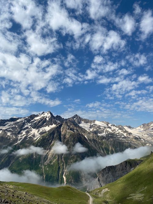 Free Breathtaking view of snow-capped mountains and blue sky in a rocky landscape. Stock Photo