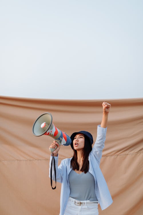 Pretty Woman Holding a Megaphone