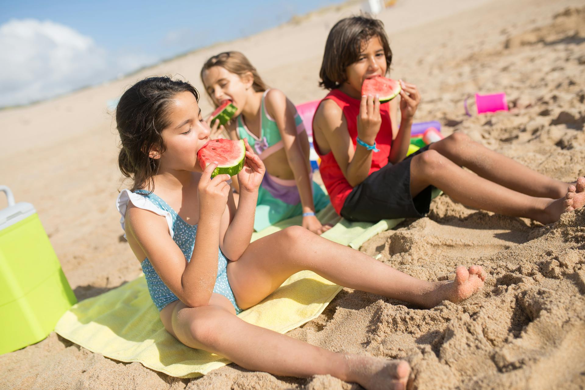 Kids at the Beach Eating Watermelon