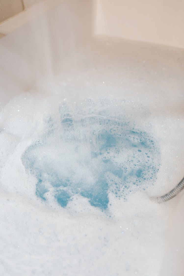 Bathtub Full Of White Foam And Bubbles 