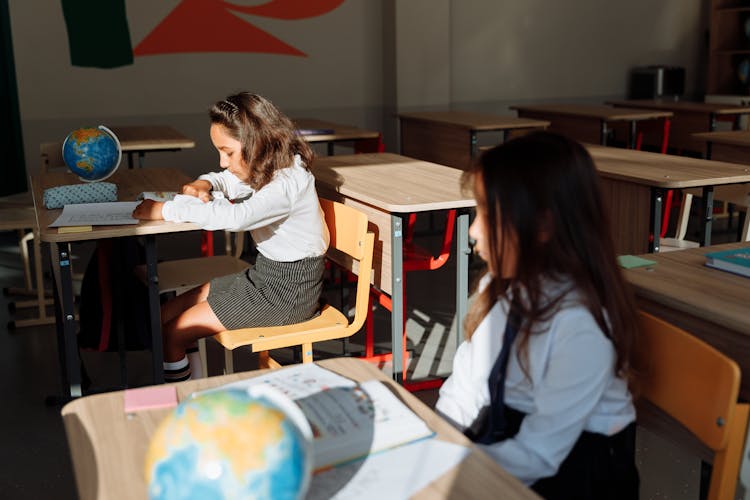 Two Students Studying Inside The Classroom