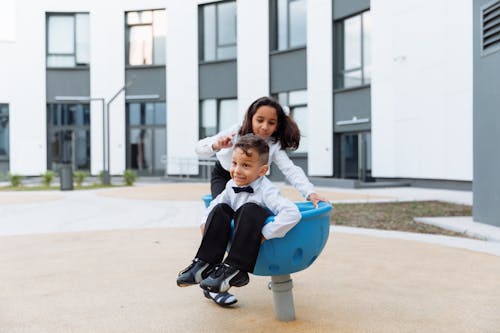 Boy and Girl Having Fun Playing Together