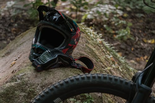 Close-up of a Helmet and Goggles on a Rock