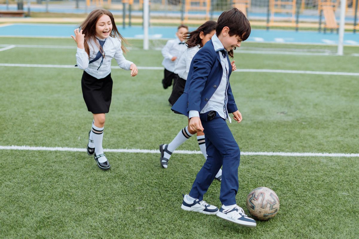 Children having fun playing soccer