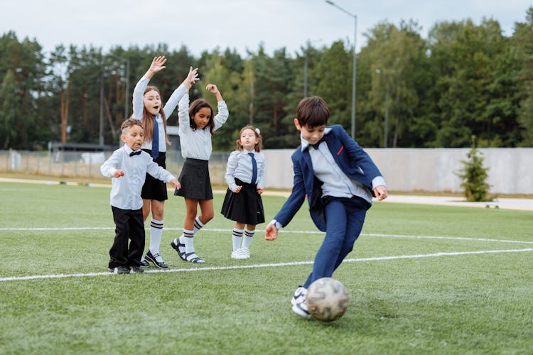 Children Having Fun Playing Soccer