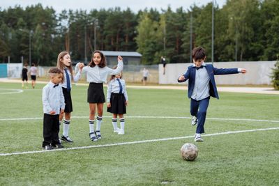 Children playing soccer