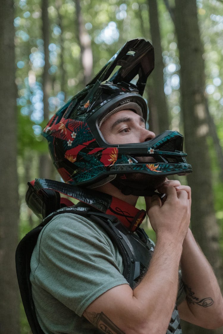 A Cyclist Wearing A Helmet