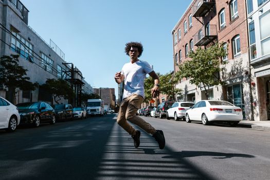 Energetic freestyle dance captured in a lively urban street setting.