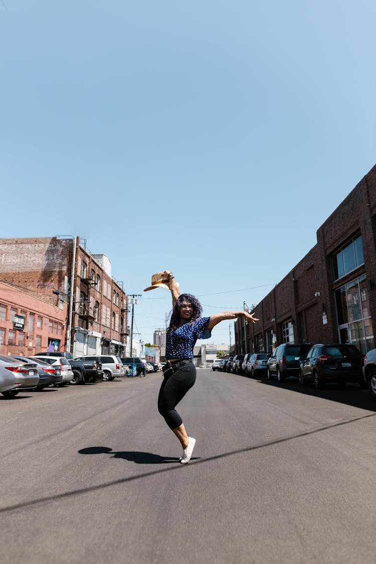 Woman Dancing On The Street