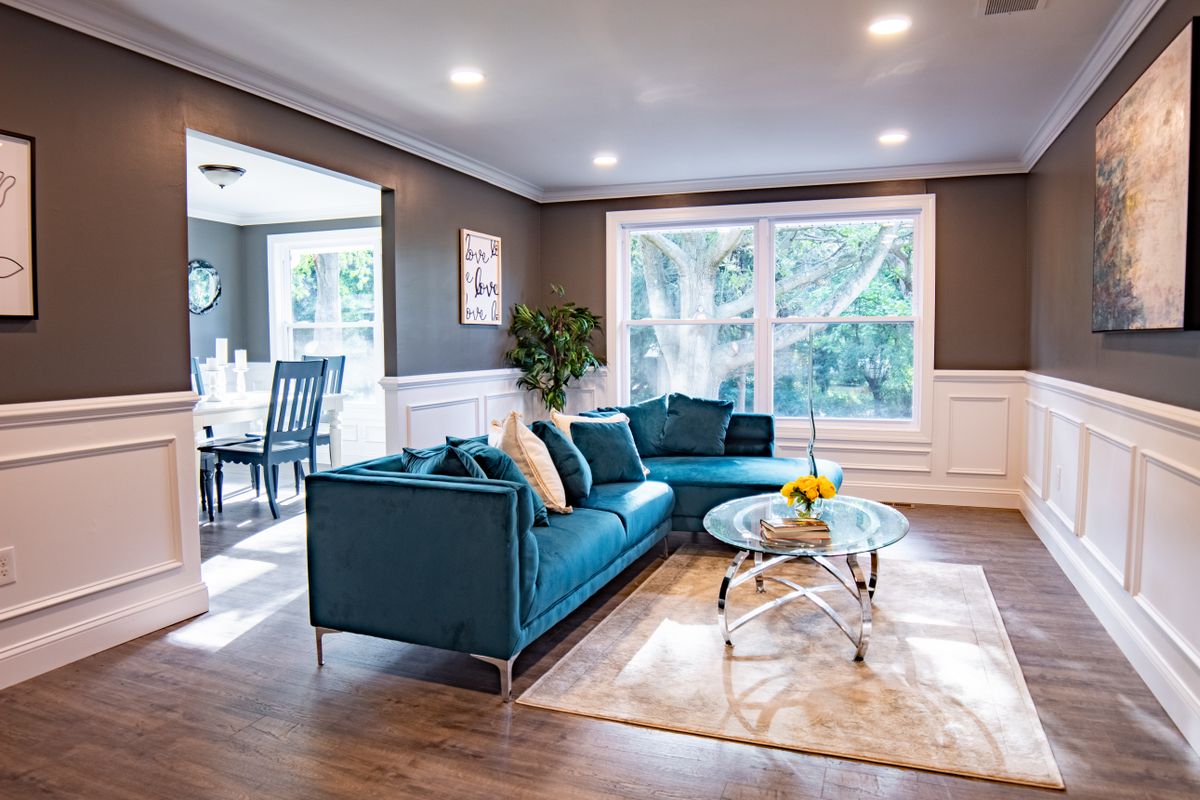 Luxury renovated living room staged for open market listing