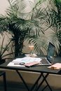 Macbook Pro on Brown Wooden Table