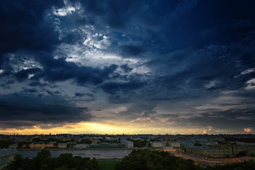 Free stock photo of city sky, sunset view, thick clouds