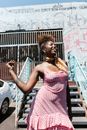 Woman in Pink Polka Dot Dress Dancing