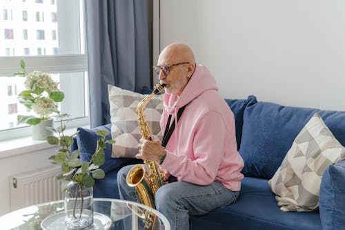 Elderly Man Playing a Saxophone
