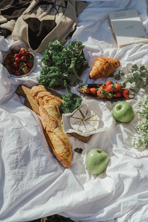 Free Bread and Fruits on a Picnic Blanket Stock Photo