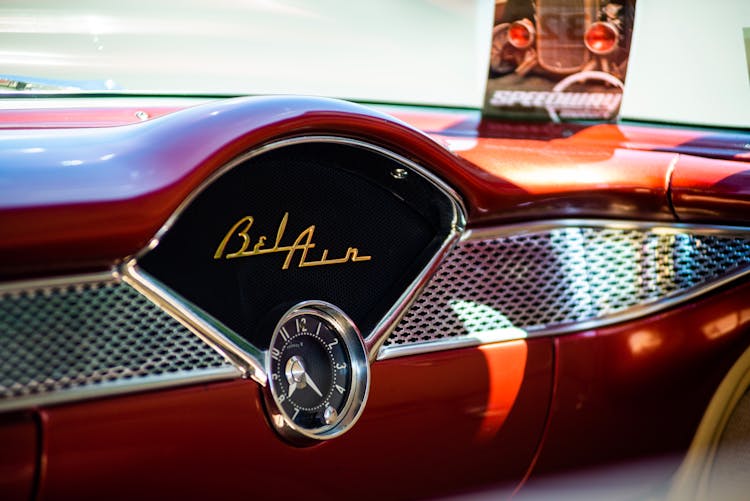 Close-up Of The Dashboard In The Classic Red Chevrolet Bel Air