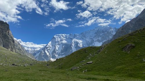 Free Breathtaking view of snow-capped mountains and green valley in Kabardino-Balkaria. Stock Photo
