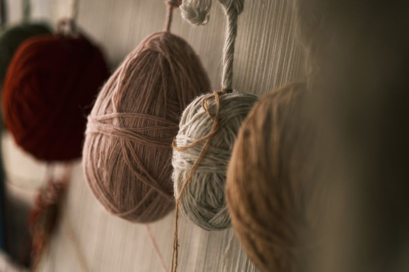 Hanging strands of coloured nylon yarn