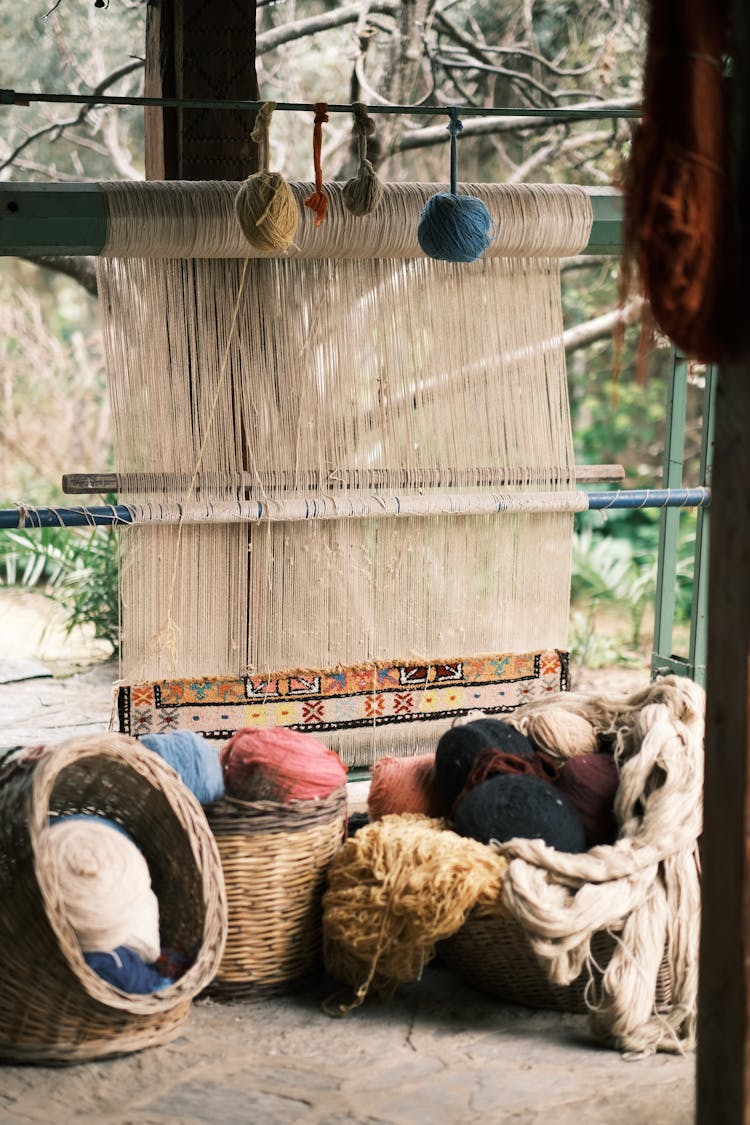 Incomplete Rug Hanging On A Loom