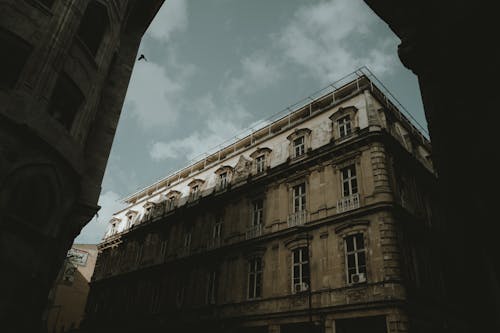 Old Concrete Building Under Gray Sky